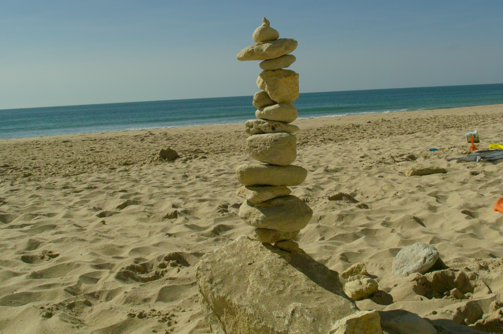 steintrum am strand